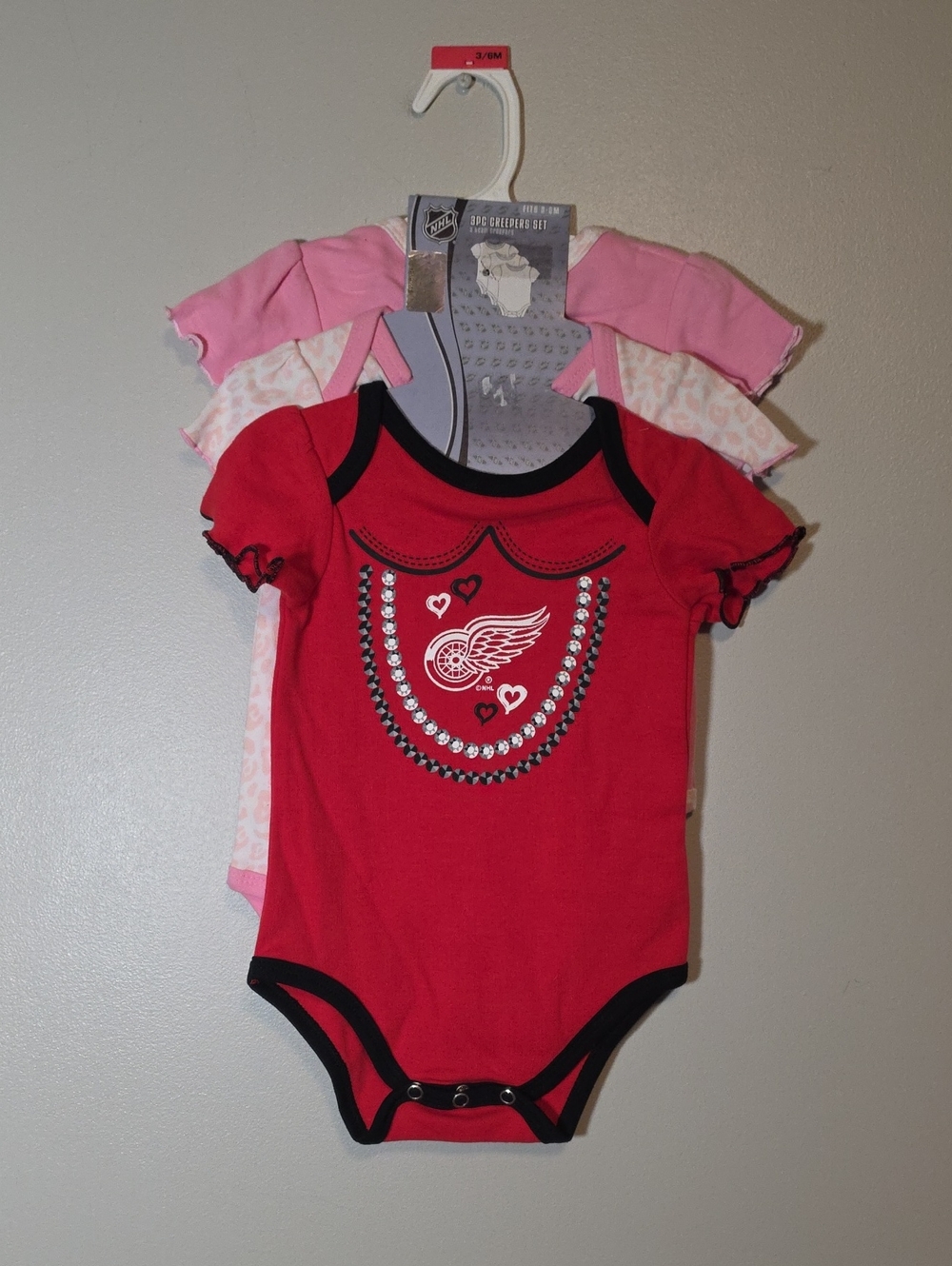 NHL Girls Red One-Piece Bodysuit with Black Trim